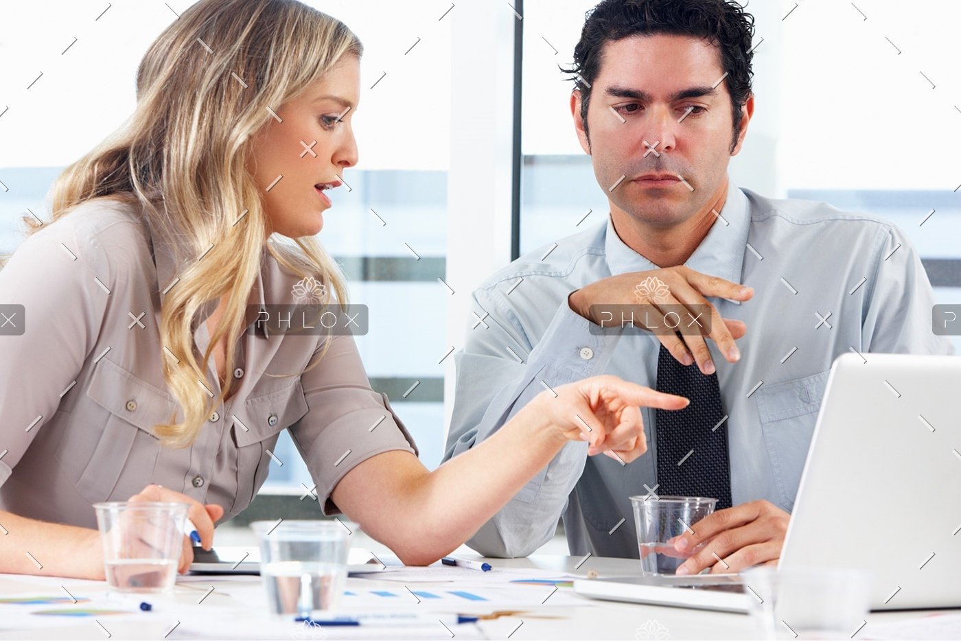 demo-attachment-1152-businessman-and-businesswoman-meeting-in-office-PZZXTMB