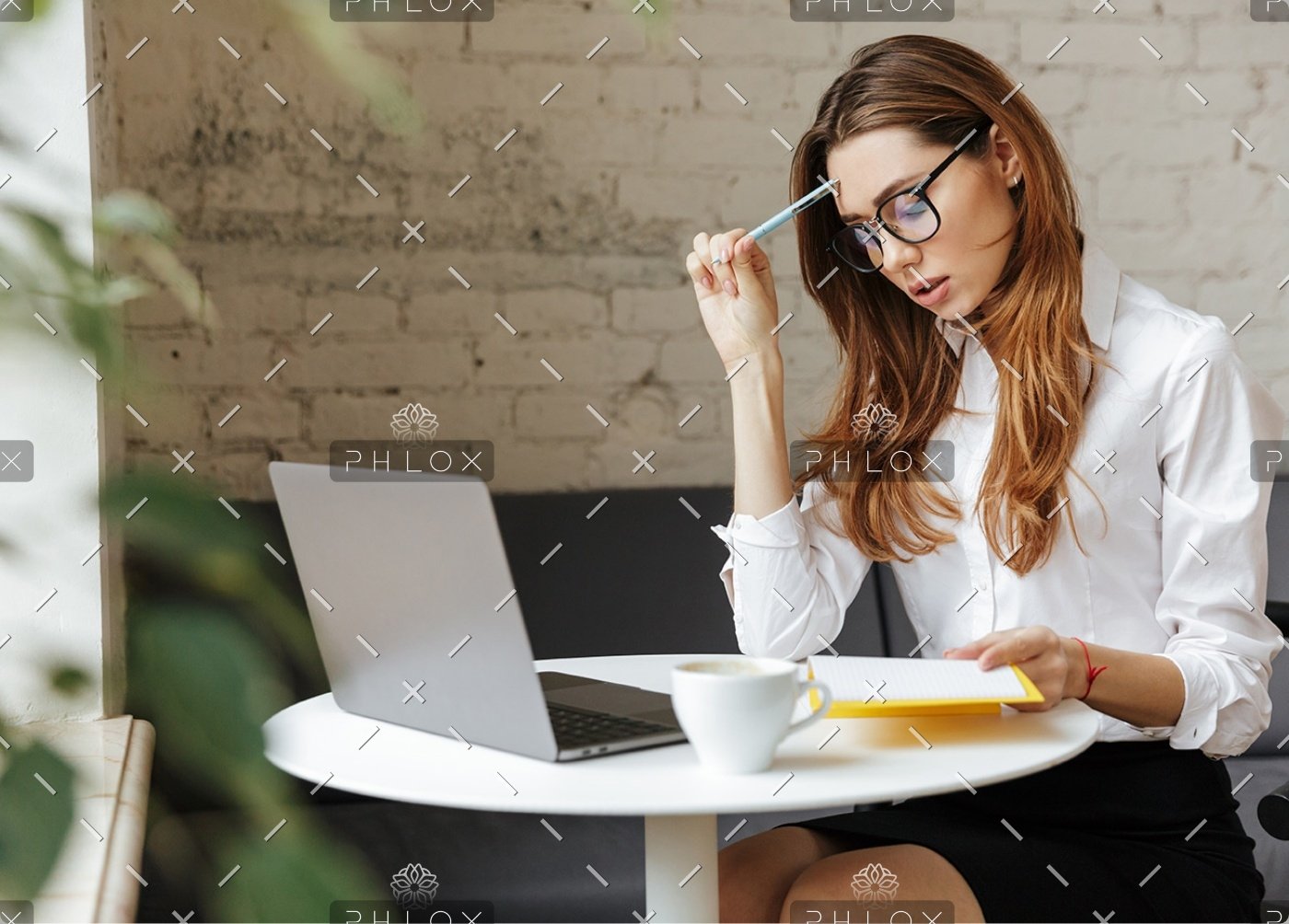 demo-attachment-1151-thoughtful-business-woman-indoors-using-laptop-P5HYUQX